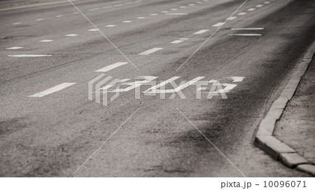 Bus text label on urban asphalt road 10096071