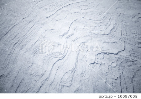 Abstract background texture of shining snowdrift with nice curved shadows Abstract background texture of shining snowdrift with nice curved shadows 10097008