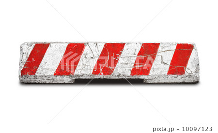Red and white striped concrete road barrier isolated on white 10097123