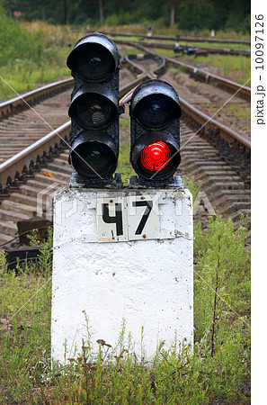 Railway semaphore shows red light 10097126