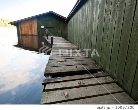 Small old wooden boat garage on Saimaa lake, typically construction for Finland Small old wooden boat garage on Saimaa lake, typically construction for Finland 10097200