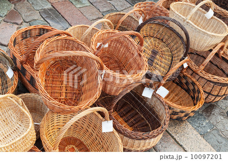 Row of handmade baskets on the street market place 10097201