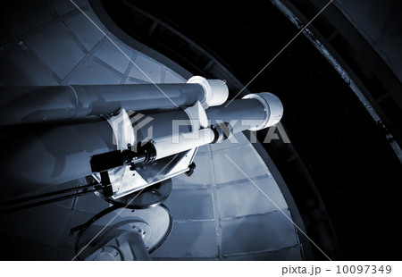 Modern professional telescope in observatory with window open to night sky 10097349