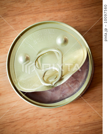 Fun smile of opened food can top view Fun smile of opened food can top view 10097560