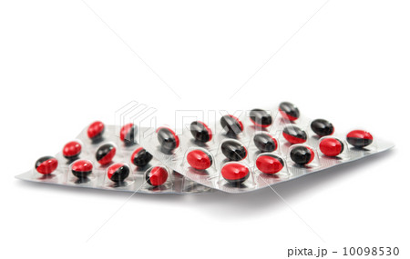 Medicine pills packed in blisters isolated 10098530