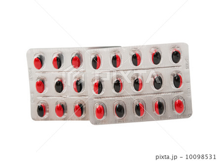 Medicine pills packed in blisters isolated 10098531
