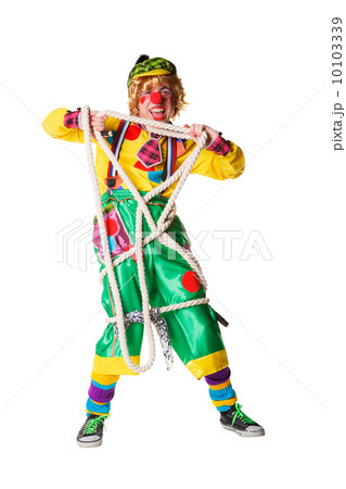 Cheerful clown got confused in a rope isolated on a white background Cheerful clown got confused in a rope isolated on a white background 10103339