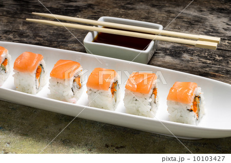 Seafood Sushi rolls in White Long Dish with soy sauce 10103427
