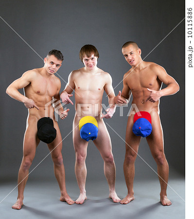 Shot of attractive young naked men posing in caps 10115886