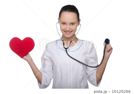 Smiling doctor holding a stethoscope and heart 10120266