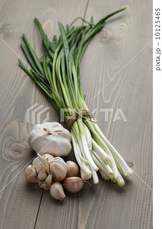 bunch of fresh green onions and garlic bunch of fresh green onions and garlic 10125465