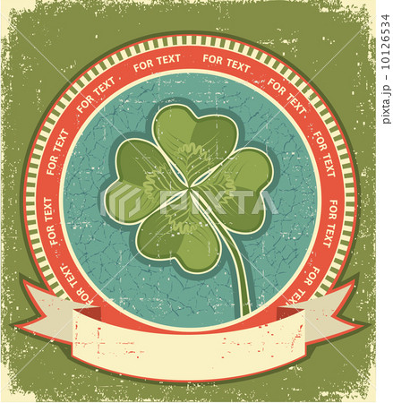 Clover label on grunge old paper background with scroll for text Clover label on grunge old paper background with scroll for text 10126534