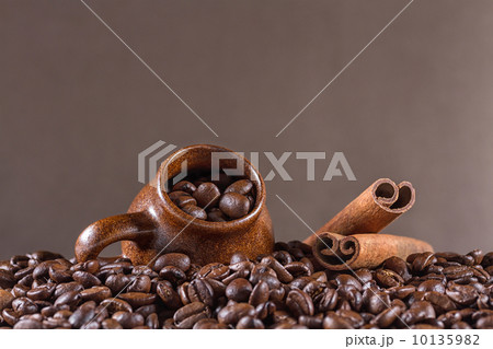 Background of coffee beans with cup Background of coffee beans with cup 10135982