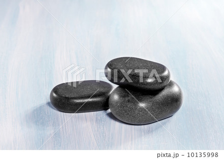 Zen stones on a wooden background 10135998