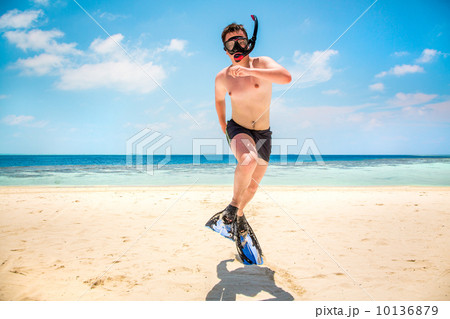 Funny man jumping in flippers and mask. Funny man jumping in flippers and mask. 10136879