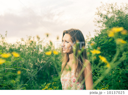 Beautiful blonde in a summer field Beautiful blonde in a summer field 10137025