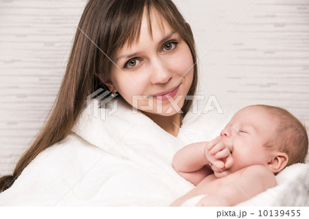 Cheerful young mother and her son 10139455