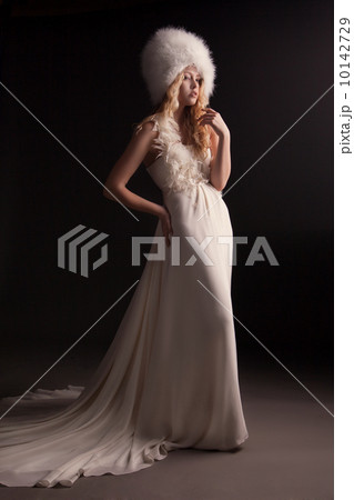The beautiful young woman in a wedding dress The beautiful young woman in a wedding dress 10142729