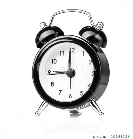 Black old style alarm clock isolated on white 10143138