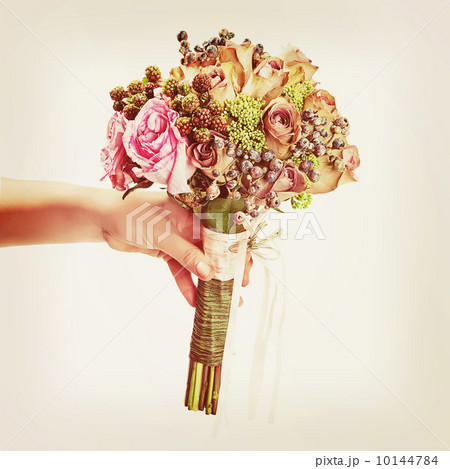 Bouquet from flowers with retro filter effect. 10144784