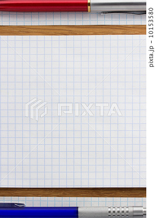 checked note paper on wood checked note paper on wood 10153580