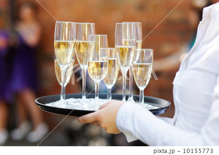 Waiter serving champagne 10155773
