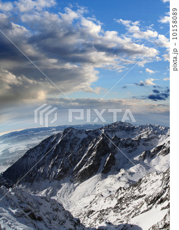 Amazing view of High winter Mountains against blue sky 10158089
