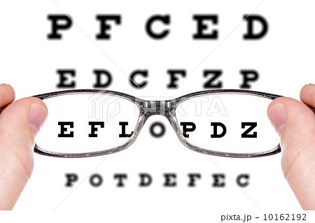 Sight test seen through eye glasses 10162192