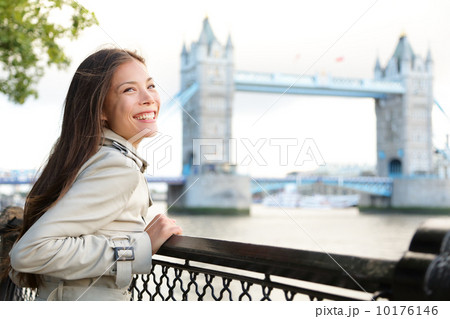 People in London - woman happy by Tower Bridge 10176146