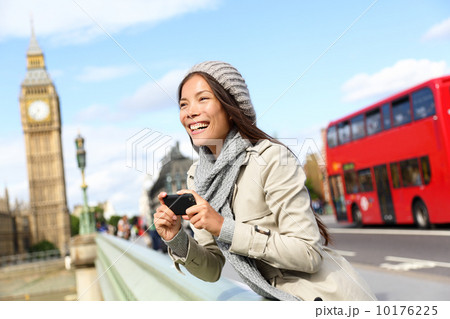 London tourist woman sightseeing taking pictures 10176225