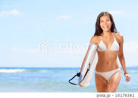 Woman surfer girl on beach Woman surfer girl on beach 10176361