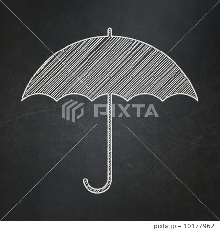 Security concept: Umbrella on chalkboard background 10177962