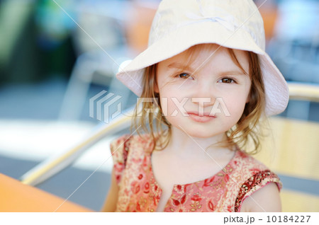 Adorable girl portrait outdoors Adorable girl portrait outdoors 10184227