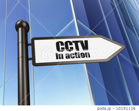 Security concept: CCTV In action on Building background 10191136