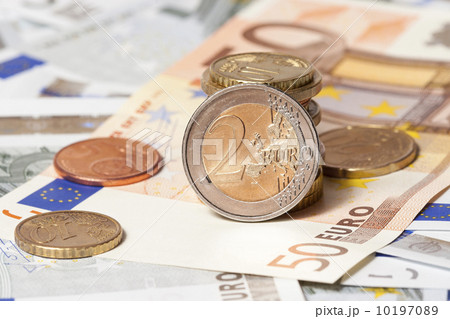 some banknotes on five and fifty euros and coins 10197089