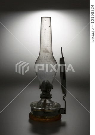 old kerosene lamp isolated on white background old kerosene lamp isolated on white background 10198224