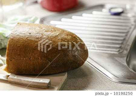 Half of bread in the kitchen Half of bread in the kitchen 10198250