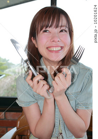 食いしん坊の女性の写真素材