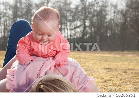 Baby is having fun on moms belly 10205853