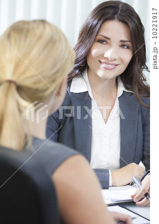 Two Women or Businesswomen in Office Meeting Two Women or Businesswomen in Office Meeting 10221917