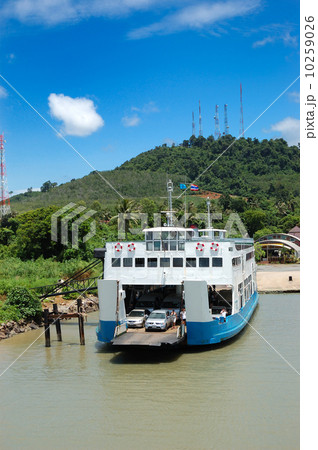 TRAT, THAILAND - SEPTEMBER 5: The Koh Chang ferry pier and ferry going to Koh Chang island on Septem 10259026