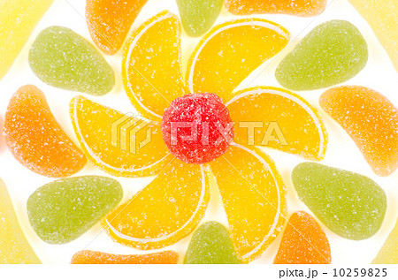 Flower made by pieces of marmalade isolated 10259825