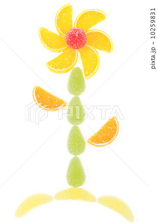 Flower made by pieces of marmalade isolated 10259831