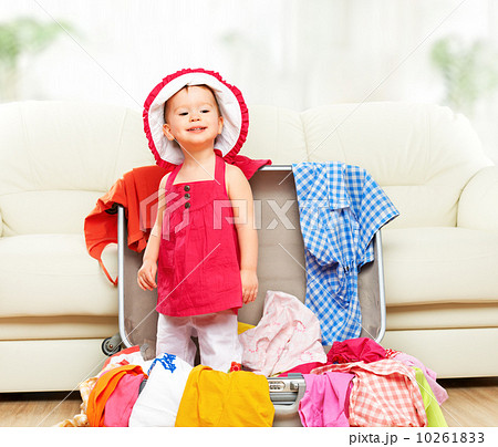 happy baby girl is going on trip, pack suitcase happy baby girl is going on trip, pack suitcase 10261833