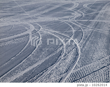 Downhill ski tracks on ski slope Downhill ski tracks on ski slope 10262014
