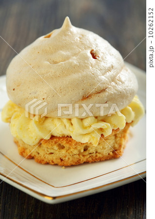 Meringue cake with orange cream. Meringue cake with orange cream. 10262152