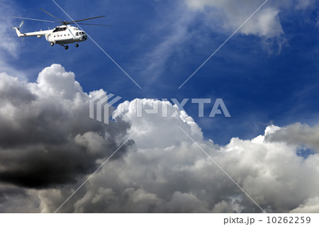 Helicopter in blue sky with clouds 10262259