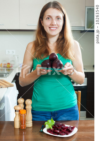long-haired woman with  beets 10263540