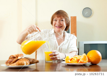 mature  woman having breakfast 10263731