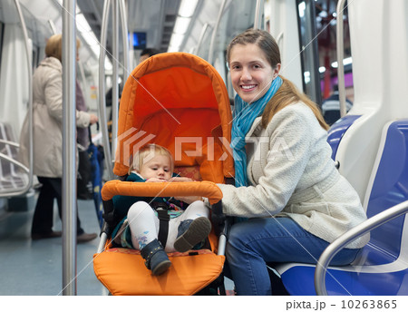 mother with baby in stroller inside metro mother with baby in stroller inside metro 10263865